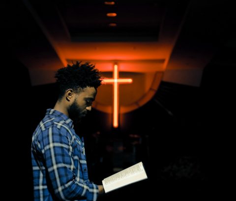 man reading book